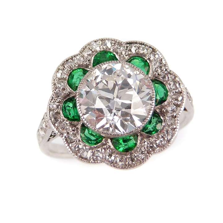 Art Deco single stone diamond and emerald flowerhead cluster ring